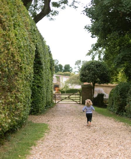 Rockbourne Green Alley with girl walking off