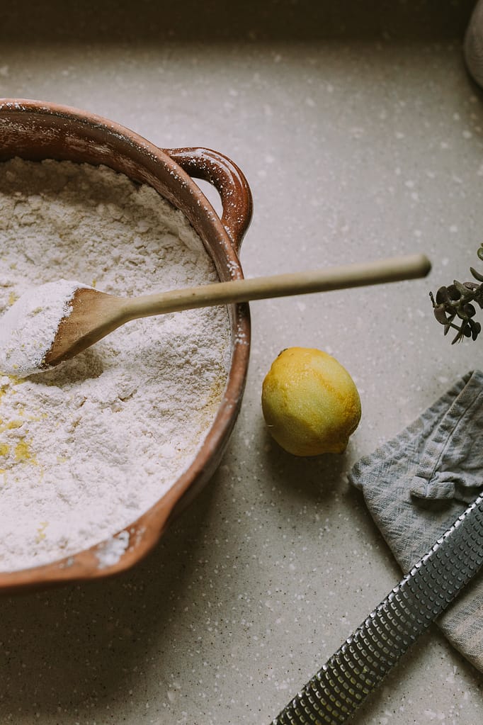 Terracotta dish with flour and lemon