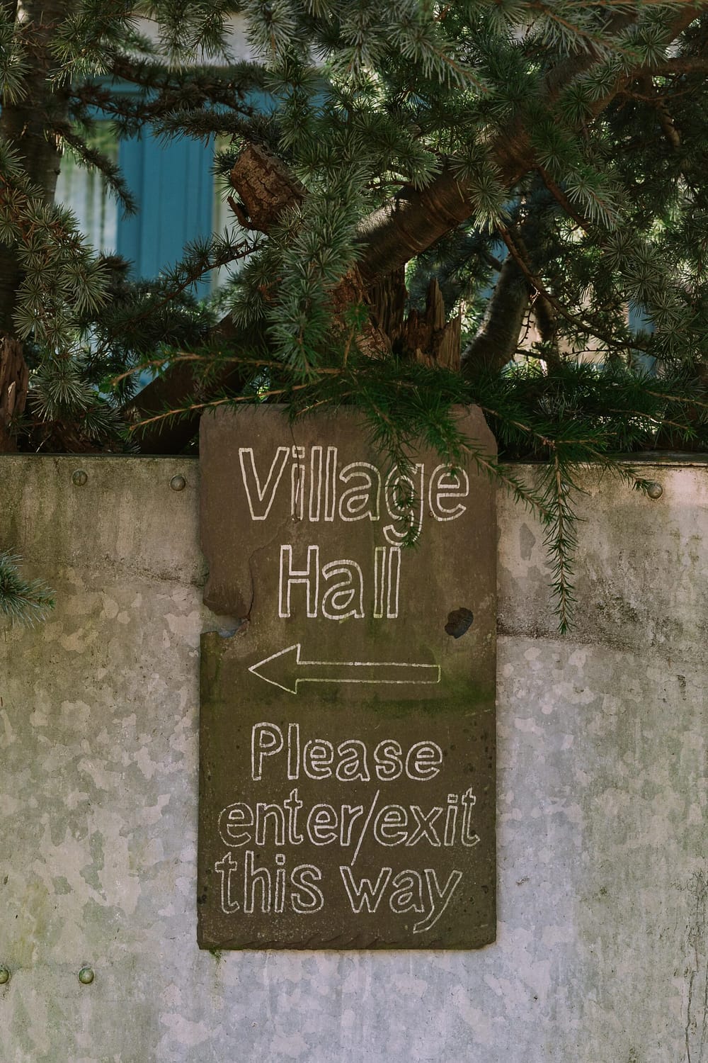 Village Hall handwritten sign on slate found at West Lexham