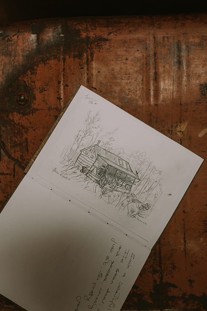 sketch_drawing_cabin_open_sketchbook