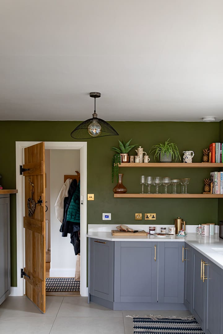 modern farmhouse kitchen with green and blue